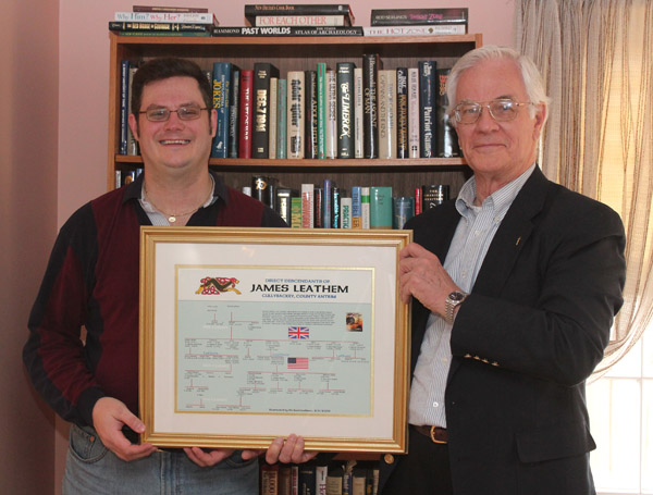 Steven and Michael Leathem holding a seven generation family tree of their Leathem relatives who emigrated from County Antrim in 1883. Submitted by Mike Leathem - December 25, 2010